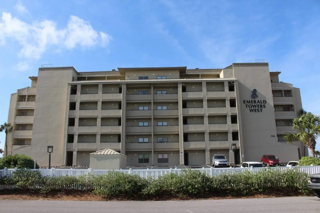 Emerald Towers West condominium building seen across the site, full elevation with balcony stacks, Fort Walton Beach, Florida.