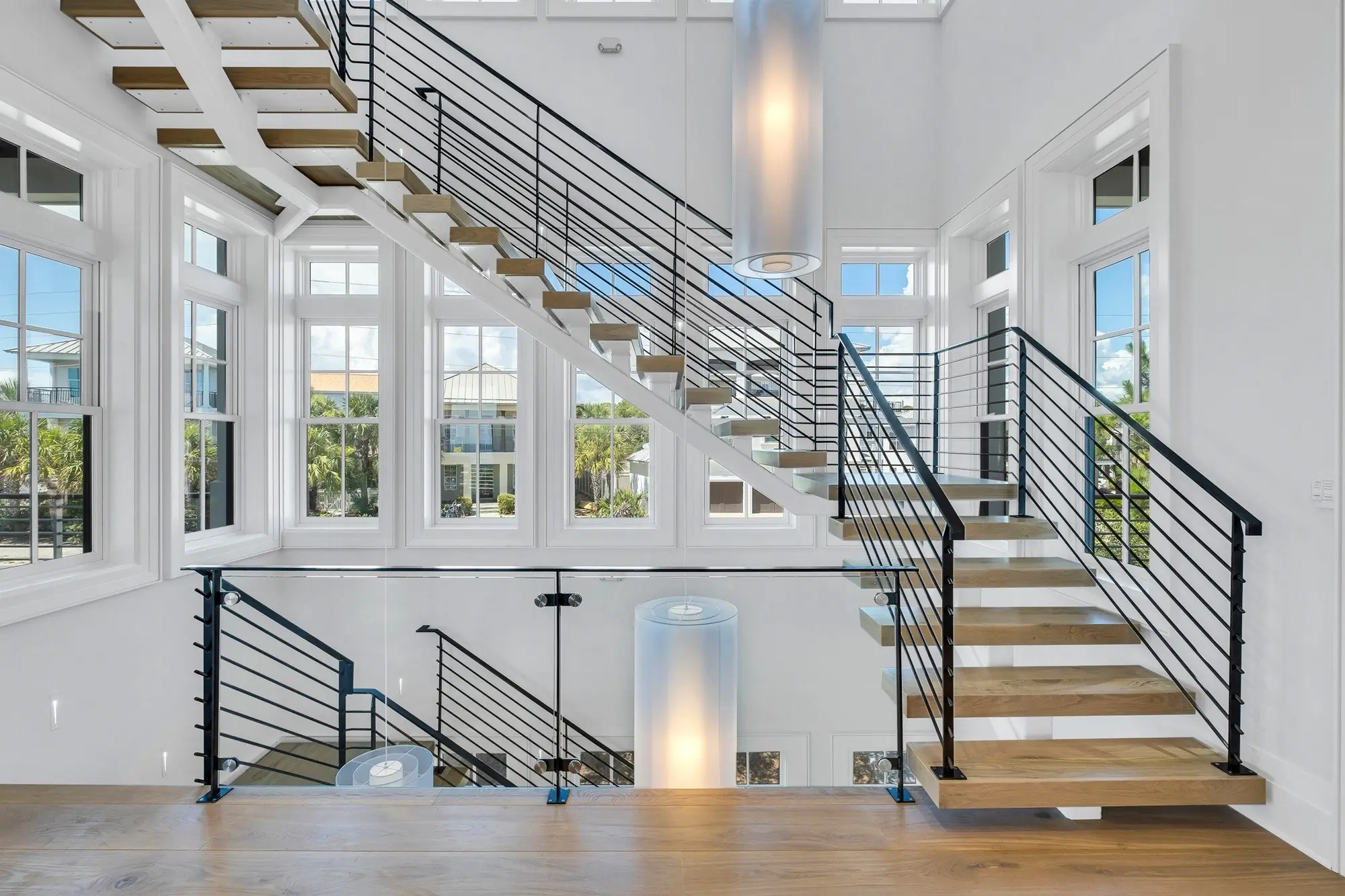 8 Bedrooms, 6.5 Bath Residential Design Seagrove Beach, a custom coastal residence engineered by O'Connell and Associates.